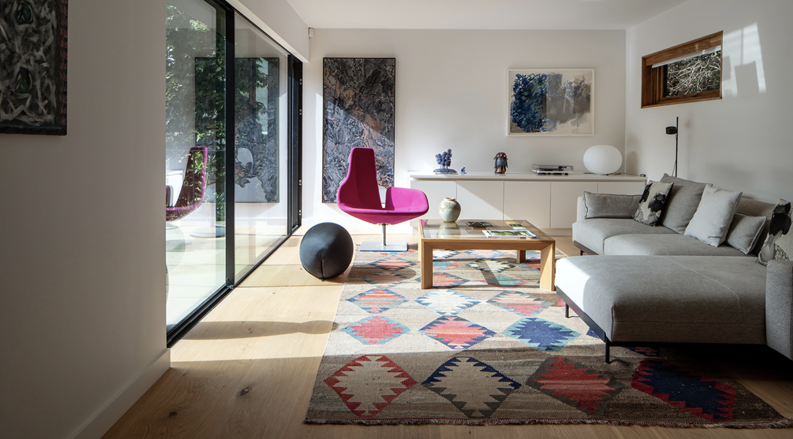 Living area with floor-to-ceiling sliding doors