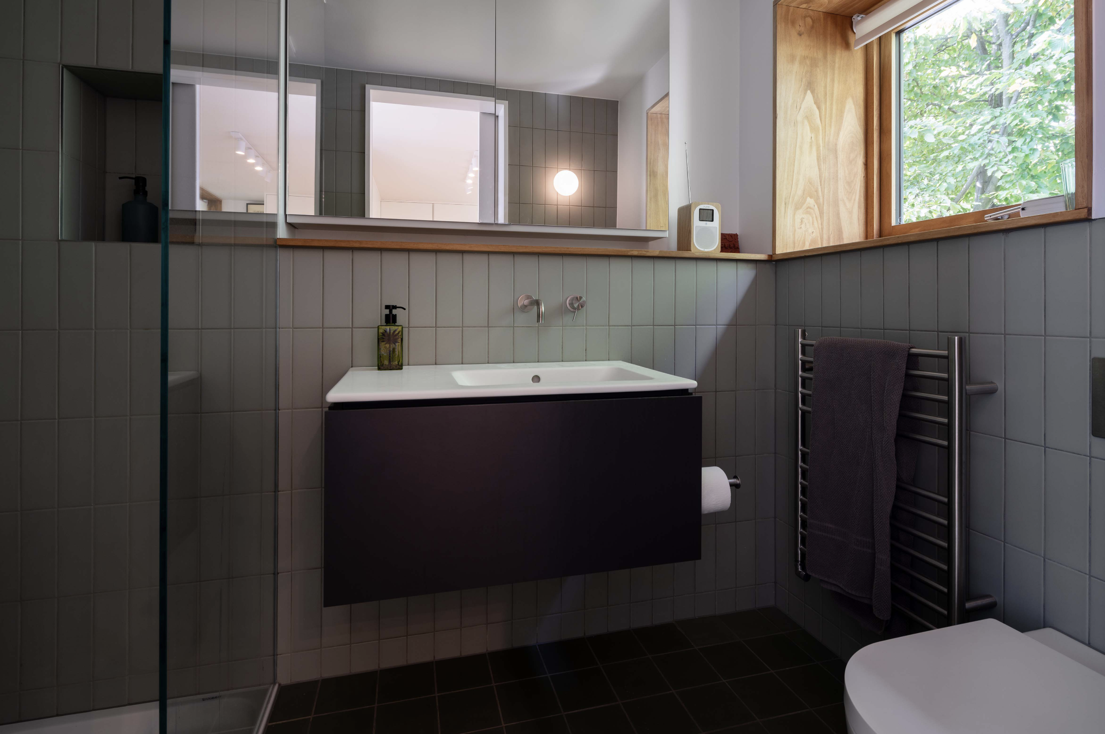 Modernised bathroom suite with deep window reveals